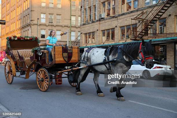 Horse carriage is seen in downtown San Antonio, Texas, United States on June 30, 2022.