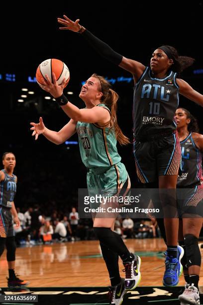 Sabrina Ionescu of the New York Liberty drives to the basket during the game against the Atlanta Dream on June 30, 2022 at the Barclays Center in...