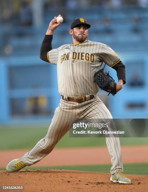 Starting pitcher Joe Musgrove of the San Diego Padres throws against the Los Angeles Dodgers during the first inning at Dodger Stadium on June 30,...