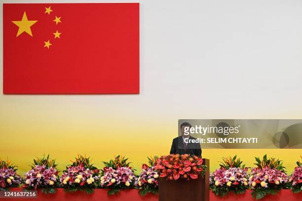 China's President Xi Jinping gives a speech following a swearing-in ceremony to inaugurate the city's new leader and government in Hong Kong on July...