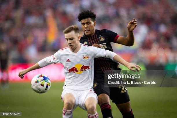 Caleb Wiley of Atlanta United fights for control of the ball against Cameron Harper of New York Red Bulls in the first half of the Major League...
