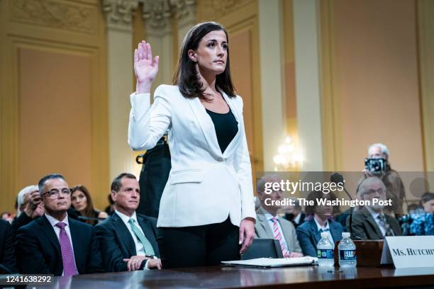 Washington, DC Cassidy Hutchinson, former aide to Trump White House chief of staff Mark Meadows, is sworn in to testify during a hearing as the House...