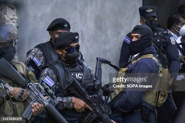 Police officers patrol in the "La Realidad" neighborhood. The Salvadoran government captured three gang members from the Barrio 18 gang after killing...