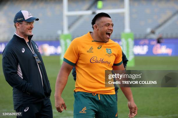 Australia's Allan Alaalatoa laughs as players gather for a team photo prior to the captains run in Perth on July 1 ahead of an opening rugby Test of...
