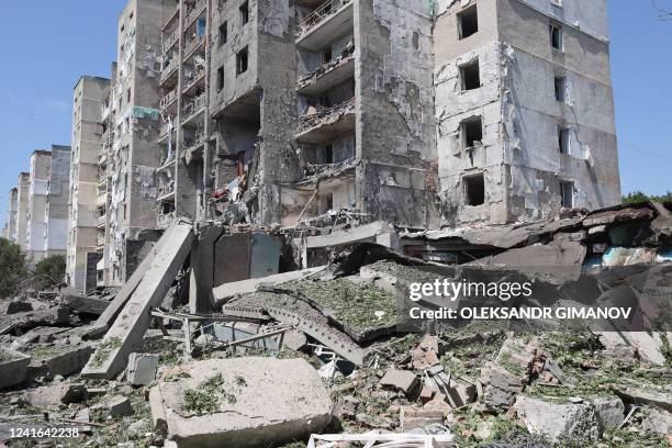 This photograph taken on July 1 shows a general view of a destroyed building after being hit by a missile strike in the Ukrainian town of Sergiyvka ,...