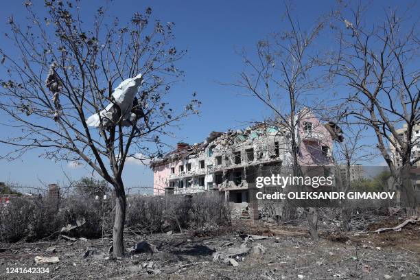 This photograph taken on July 1 shows a general view of a destroyed building after being hit by a missile strike in the Ukrainian town of Sergiyvka ,...