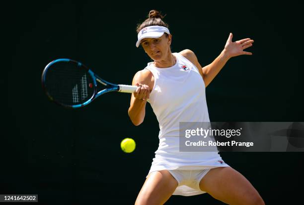 Irina-Camelia Begu of Romania in action against Jelena Ostapenko of Latvia in her third round match during Day Five of The Championships Wimbledon...