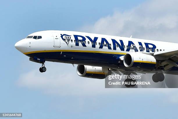 Ryanair Boeing 737-8AS aircraft lands at El Prat airport in Barcelona on July 1, 2022. Nine flights to and from Spain were cancelled on July 1 and...