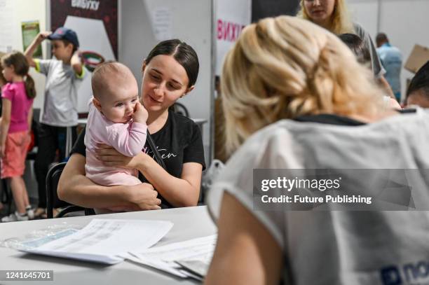 Woman with a baby visits Ukraines first Help Centre for Rescued, Zaporizhzhia, southeastern Ukraine. This photo cannot be distributed in the Russian...