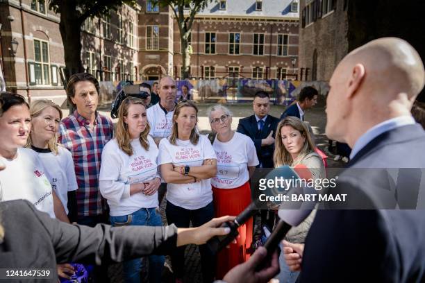 Dutch Minister of Health, Welfare and Sport Ernst Kuipers talks to general practitioners protesting against heavy workload at the Binnenhof as part...