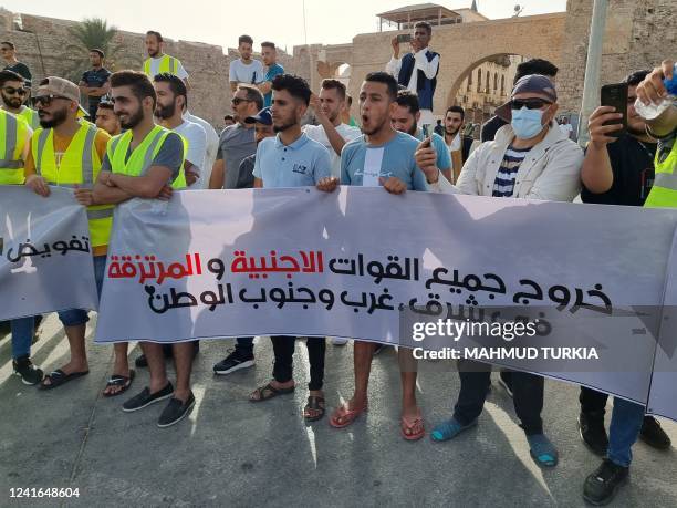 Libyans gather at the Martyrs' Square of Libya's capital Tripoli on July 1 to protest against the political situation and dire living conditions.