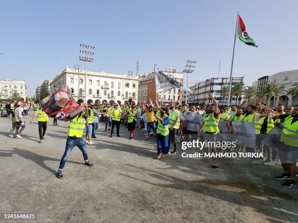 Libyans gather at the Martyrs' Square of Libya's capital Tripoli on July 1 to protest against the political situation and dire living conditions.