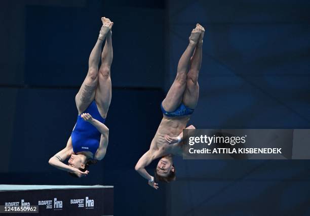 Ukraine's Sofiia Lyskun and Oleksii Sereda compete to take silver in the mixed 10m synchronised diving finals at the Duna Arena in Budapest on July...