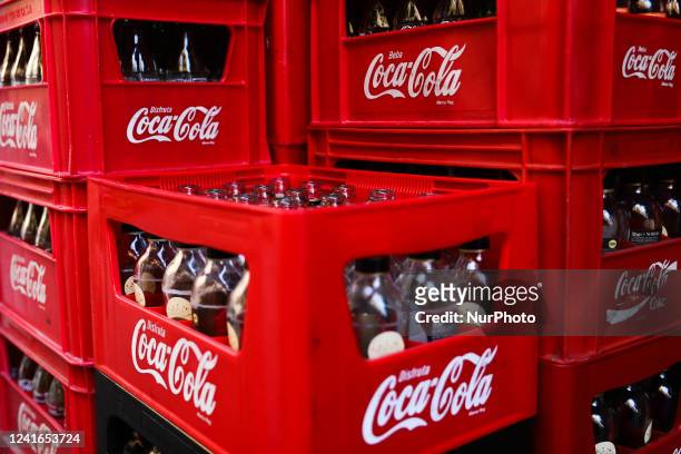 Coca-Cola boxes are seen in Madrid, Spain on July 1, 2022.