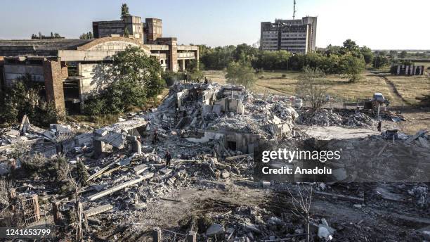 An aerial view of rescue workers carrying out operations after the Russian missile attacks where at least 17 people have died and 31 have injured in...