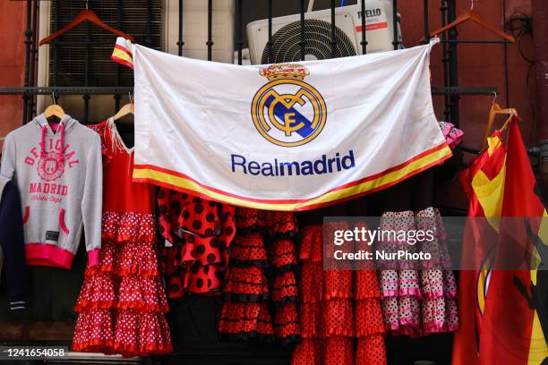 Real Madrid logo is seen on a banner at the souvenir shop in Madrid, Spain on June 27, 2022.