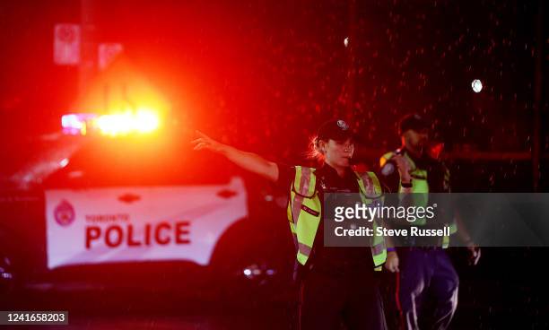 Police direct traffic and pedestrians. Thousands gather at Ashbridges Bay Beach to watch Canada Day fireworks at in Toronto. July 1, 2022. Toronto...