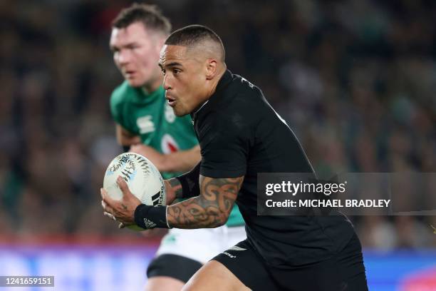 New Zealands Aaron Smith runs the ball during the rugby Test match between the New Zealand All Blacks and Ireland at Eden Park in Auckland on July 2,...