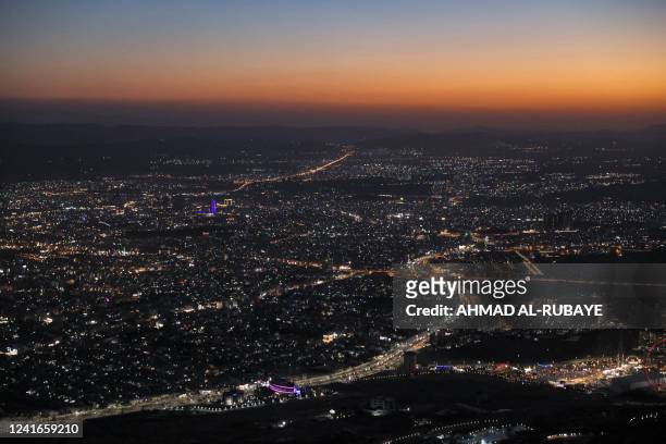 This picture taken on July 1, 2022 shows a sunset view from Mount Azmar of Iraq's northeastern city of Sulaymaniyah in the autonomous Kurdistan...