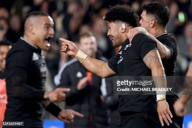 New Zealands Ardie Savea celebrates his try with teammates during the rugby Test match between the New Zealand All Blacks and Ireland at Eden Park in...