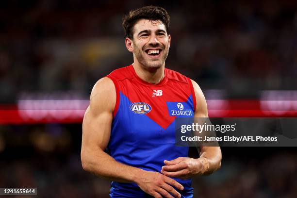 Christian Petracca of the Demons reacts during the 2022 AFL Round 16 match between the Adelaide Crows and the Melbourne Demons at the Adelaide Oval...