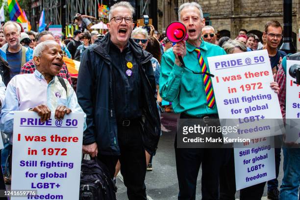 Songwriter and broadcaster Tom Robinson stands alongside LGBT+ rights activist Peter Tatchell during a march to mark the 50th anniversary of the...
