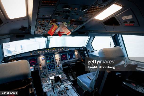 The cockpit of an Airbus SE A330 airplane during a tour of a new maintenance hangar and control tower, at Chateauroux-Centre "Marcel Dassault"...