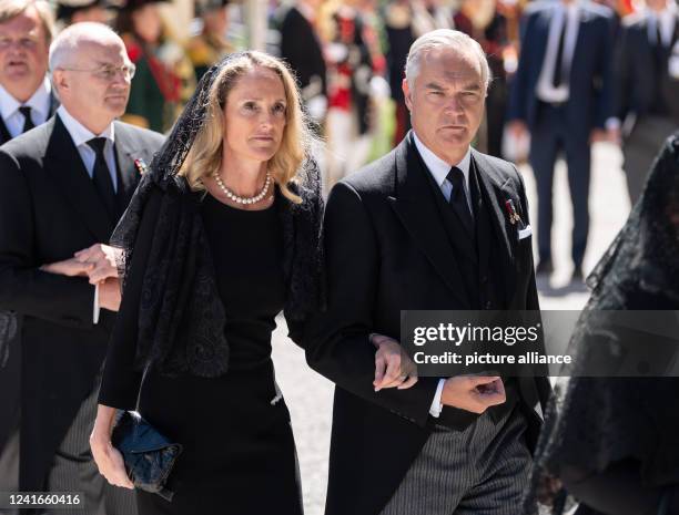 July 2022, Baden-Wuerttemberg, Altshausen: Phillip Duke of Württemberg and his wife Marie Duchess of Württemberg before the start of the funeral...