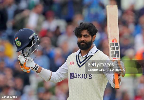 India's Ravindra Jadeja celebrates his century during play on Day 2 of the fifth cricket Test match between England and India at Edgbaston,...