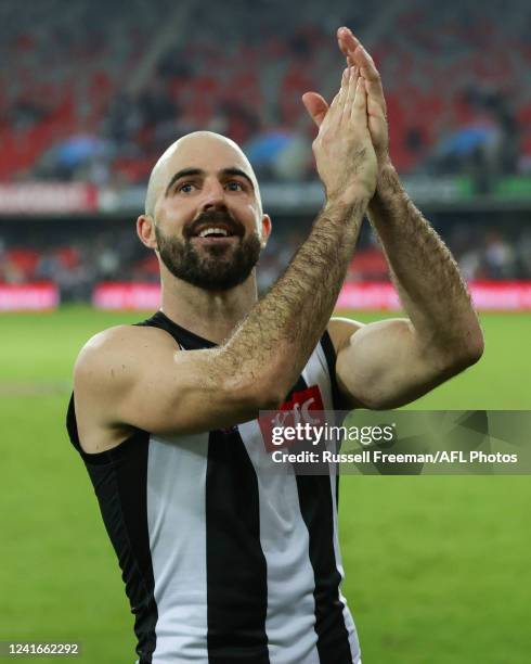 Steele Sidebottom of the Magpies acknowledges the crowd after the 2022 AFL Round 16 match between the Gold Coast Suns and the Collingwood Magpies at...