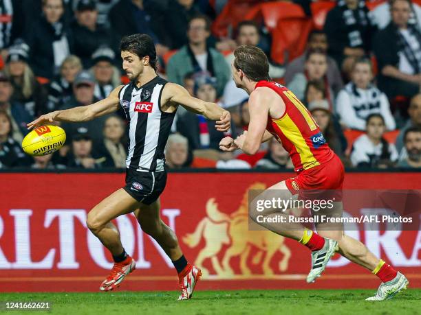 Josh Daicos of the Magpies in action during the 2022 AFL Round 16 match between the Gold Coast Suns and the Collingwood Magpies at Metricon Stadium...