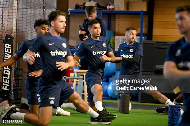 Levi Colwill and Hakim Ziyech of Chelsea during a warm up in the gym before a training session at Chelsea Training Ground on July 2, 2022 in Cobham,...