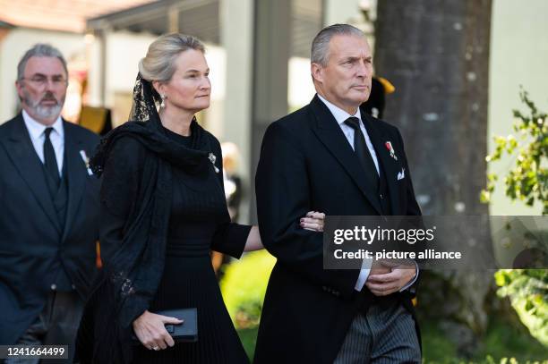 July 2022, Baden-Wuerttemberg, Altshausen: Duke Eberhard and Duchess Marie von Württemberg after the funeral service for Carl Duke of Württemberg at...