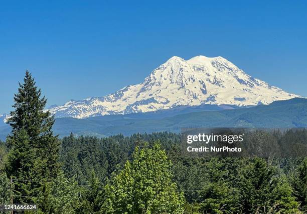 Mount Rainier viewed from Eatonville near Mt Rainier National Park on Tuesday, June 28 2022. Ascending to 14,410 feet above sea level, Mount Rainier...