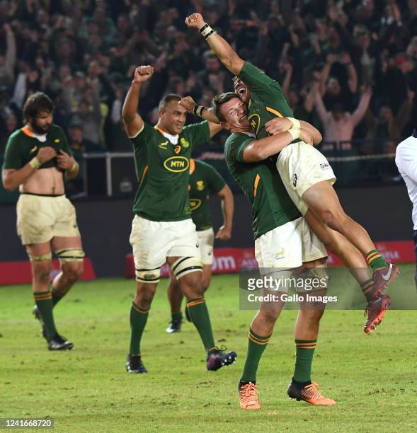 Elrigh Louw and Cheslin Kolbe of the Springboks celebrate during the first test match of the 2022 Castle Lager Incoming Series between South Africa...