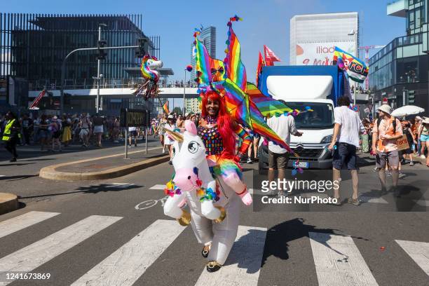 Members of the Lesbian, Gay, Bisexual and Transgender community gather together after taking part in the annual Pride Parade in the streets of Milano...