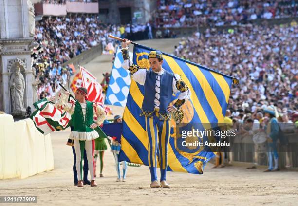 Flaggers of Contrada of Dragon take part in the famous Palio Di Siena horse race that is held twice each year, on July 2 and August 16, at Siena's...