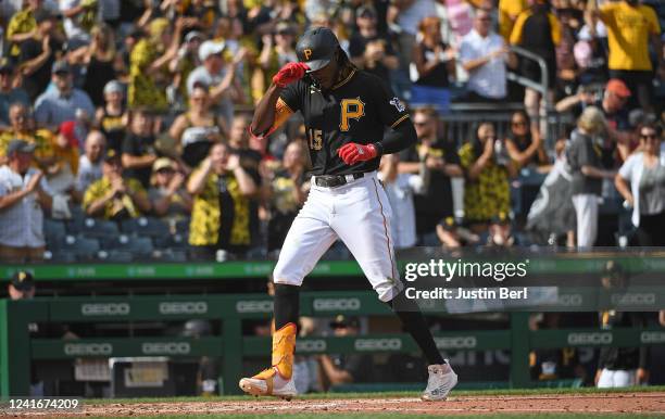 Oneil Cruz of the Pittsburgh Pirates reacts as he rounds the bases after hitting a home run in the fourth inning during the game against the...