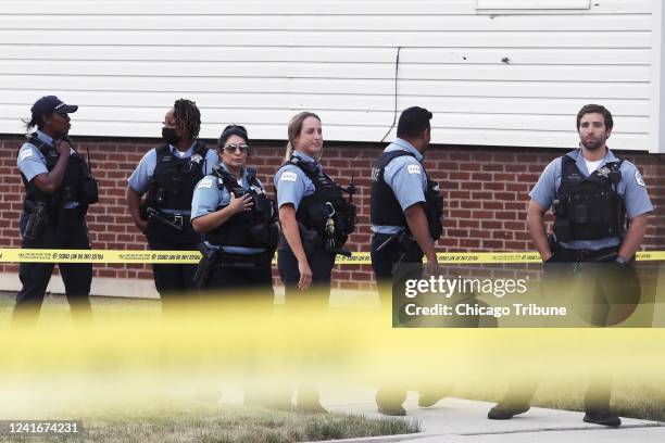 Chicago police secure a crime scene at 66th Street and Wolcott Avenue in Chicago where a person reportedly was shot in the head on July 1, 2022.