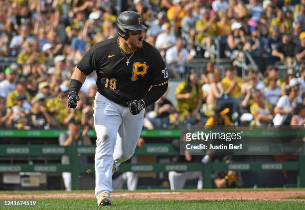Daniel Vogelbach of the Pittsburgh Pirates reacts after hitting a two-run RBI single to right field in the fifth inning during the game against the...