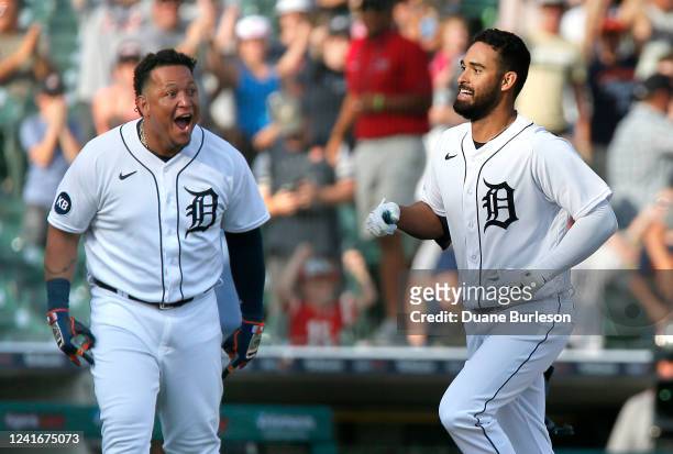 Miguel Cabrera of the Detroit Tigers celebrates as Riley Greene comes home with a walk-off home run for his first career MLB home run to defeat the...