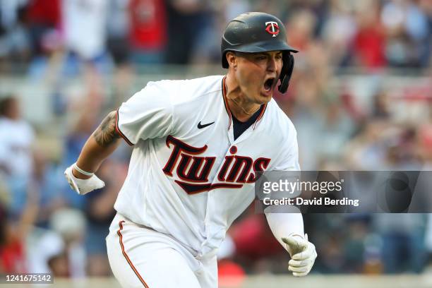 Jose Miranda of the Minnesota Twins celebrates his walk off single against the Baltimore Orioles in the ninth inning of the game at Target Field on...