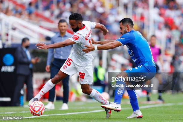Jordan Sierra of Toluca competes for the ball with Jose Esquivel of Necaxa during the 1st round match between Necaxa and Toluca as part of Torneo...