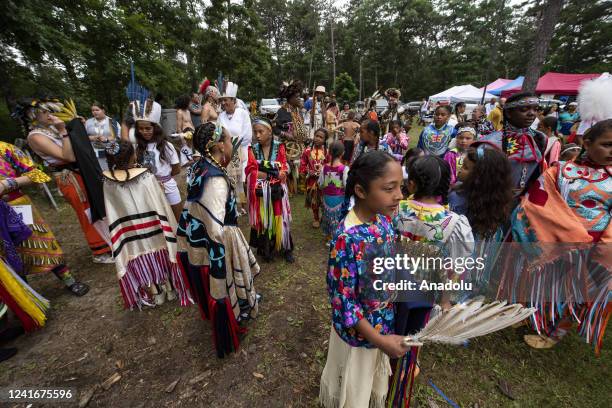 Indigenous people line up for the Grand Entry during the Mashpee Wampanoagâââââââ Tribe's 101st annual Powwow in Mashpee, Massachusetts on July 2,...