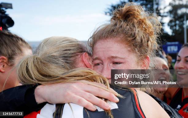 Georgia Nanscawen of the Bombers celebrates with teammates during the 2022 VFLW Grand Final match between Essendon and the Southern Saints at ETU...