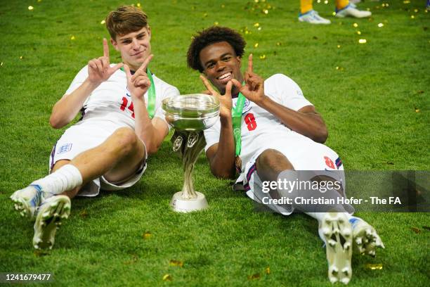 Alex Scott and Carney Chukwuemeka of England celebrate with UEFA European Under-19 Championship Trophy following their sides victory after the UEFA...