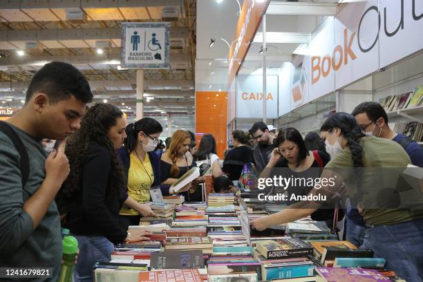 Visitors look at books on display at the 26th Sao Paulo International Book Biennial 2022 , in Sao Paulo, Brazil on July 01, 2022. The biggest event...