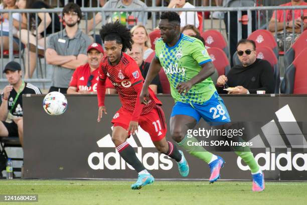 Jayden Nelson and Yeimar Gomez Andrade in action during the MLS game between Toronto FC and Seattle Sounders FC at BMO field in Toronto. The game...