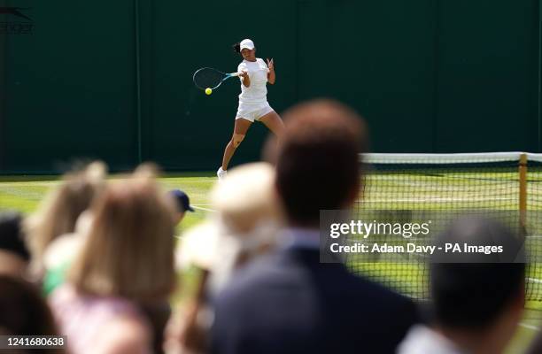 Crowds watch Hannah Klugman in action during the Girls SinglesÕ first round match against Yu-Yun Li during day seven of the 2022 Wimbledon...
