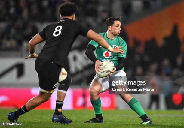 Auckland , New Zealand - 2 July 2022; Joey Carbery of Ireland in action against Ardie Savea of New Zealand during the Steinlager Series match between...